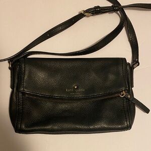 Kate Spade Black Pebbled Leather Crossbody Bag 9"W/6"L
2 separate compartments